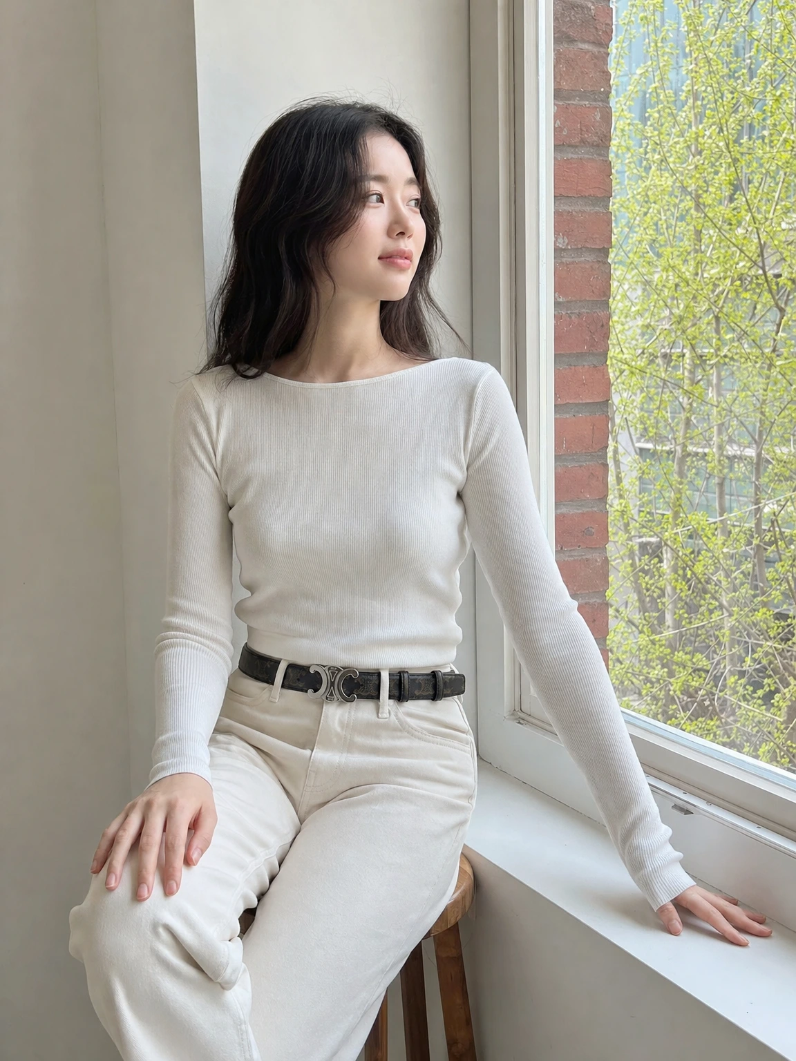 트리옴프 버클이 돋보이는 벨트